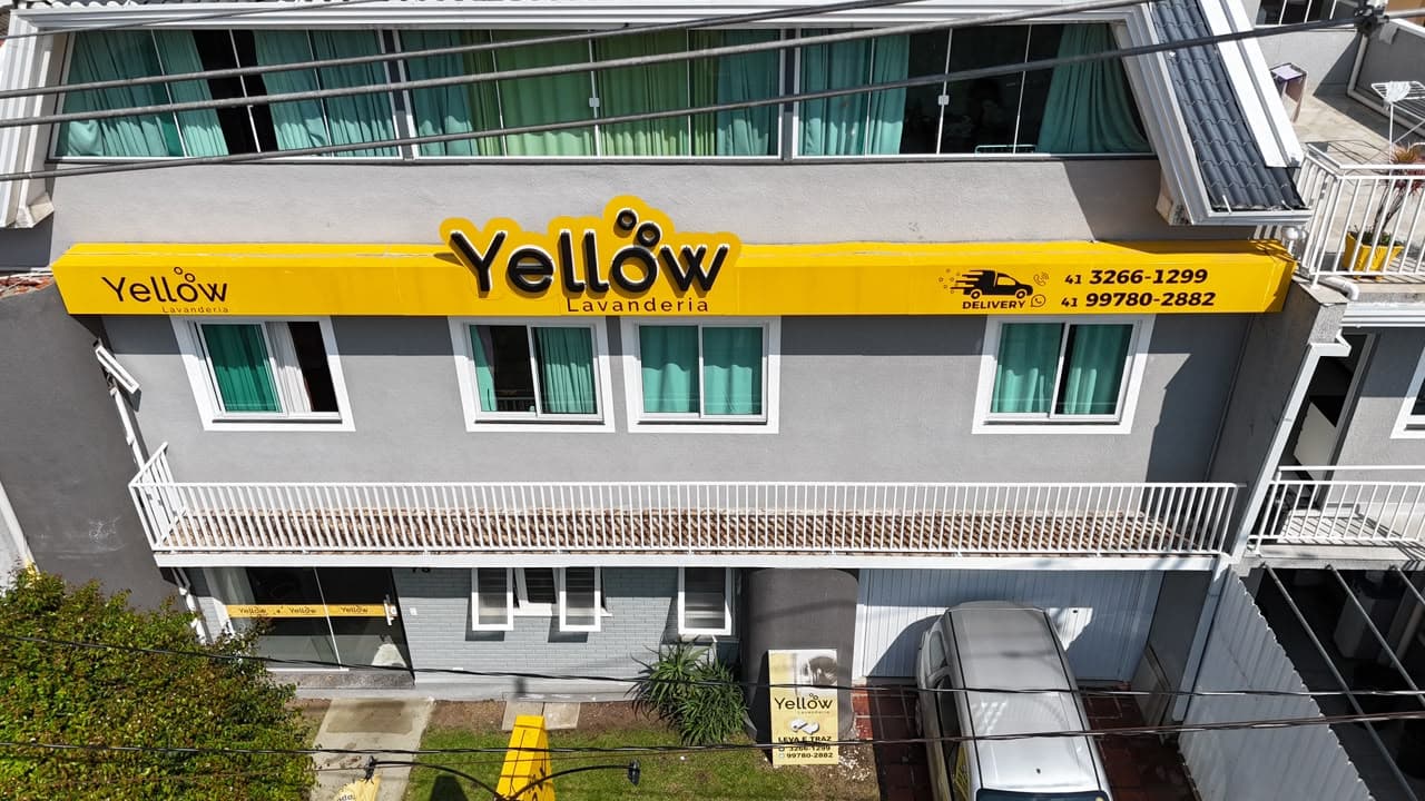 Fachada da Lavanderia Yellow no Jardim das Américas, lavanderia em Curitiba desde 1989